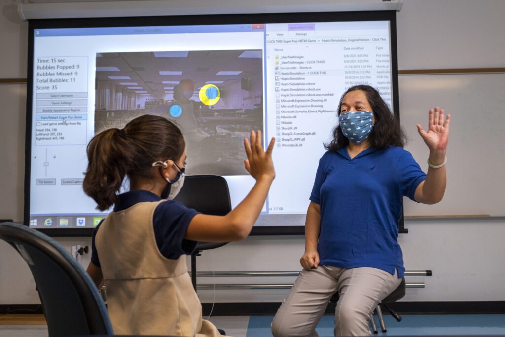 Yuping Chen demonstrates her virtual reality video game