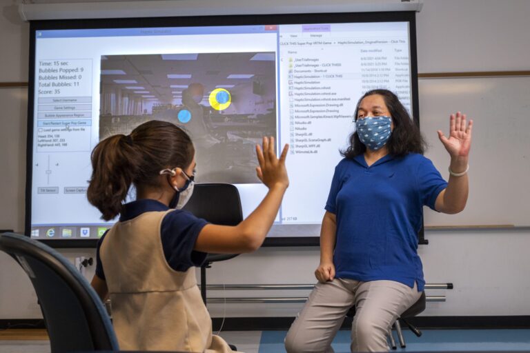 Yuping Chen demonstrates her virtual reality video game