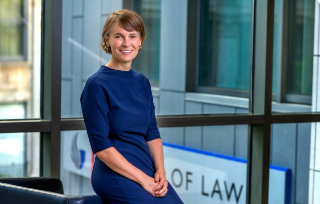 Charlotte Alexander posing inside the Georgia State College of Law building