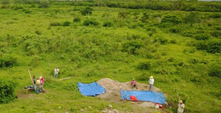 Glover, Rissolo, and project members finish up excavations at an ancient house mound at Conil.