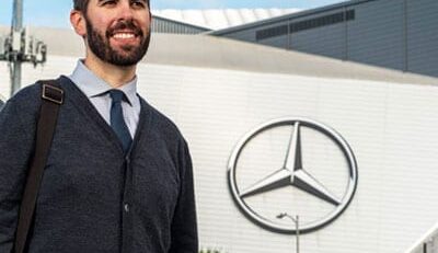 A photo of Tim Kellison in front of Mercedes-Benz Stadium