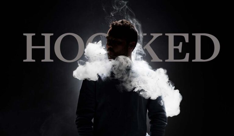Man vaping in front of word "Hooked"